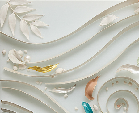 Detail from a three-panel ceramic-on-glass artwork by Maria called 'Beneath your Feet'. Many ceramic ribbons, leaves, and pebbles evoke the flow of water rising from beneath the earth.