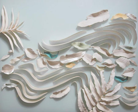 The fourth panel in a large five-panel ceramic artwork on glass. Ceramic ribbons, leaves and pebbles mimic the flow of water in a monsoon vine forest.