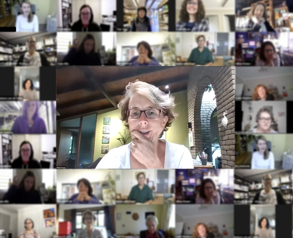 A collage of people photos from a video meeting, with one large photo in the middle.
